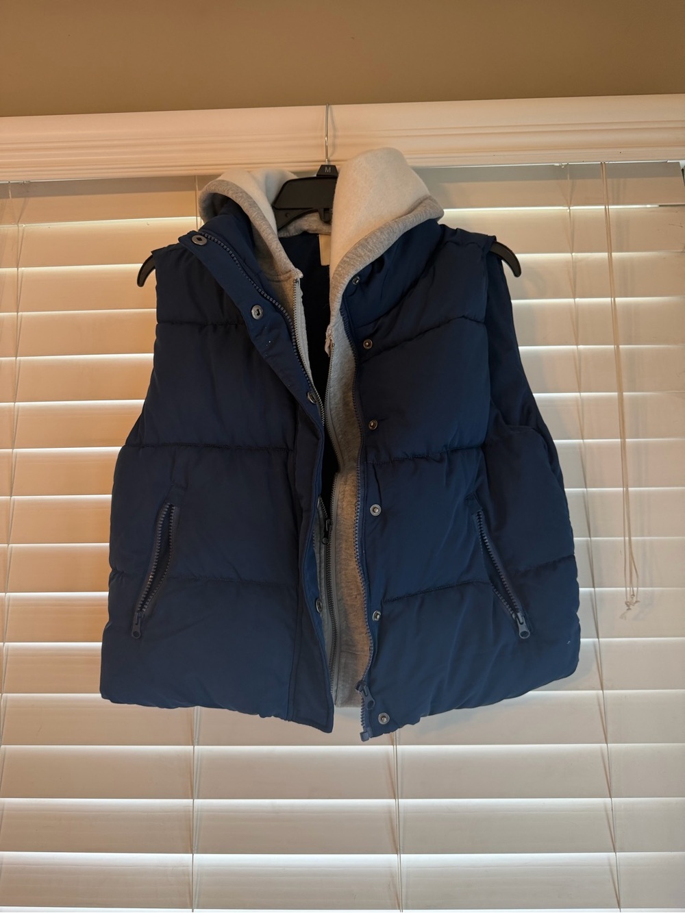 Navy Puffer Vest with Gray Hoodie Layer